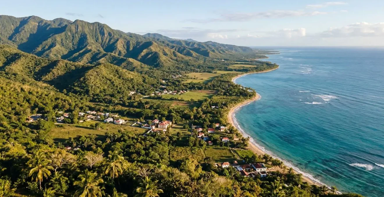Aerial view of Dominican Republic's coastline with mountains and beaches showcasing Caribbean diversity