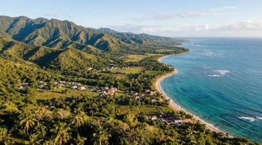 Aerial view of Dominican Republic's coastline with mountains and beaches showcasing Caribbean diversity