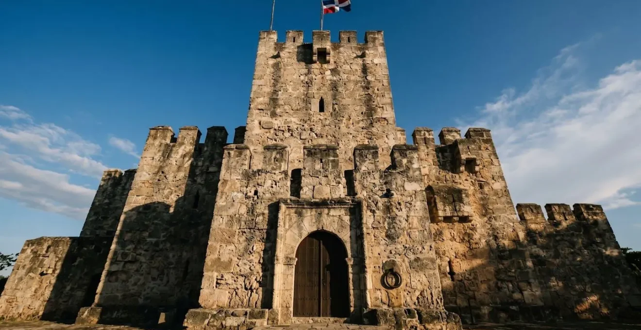 Ancient stone fortress tower against dramatic sky in Santo Domingo