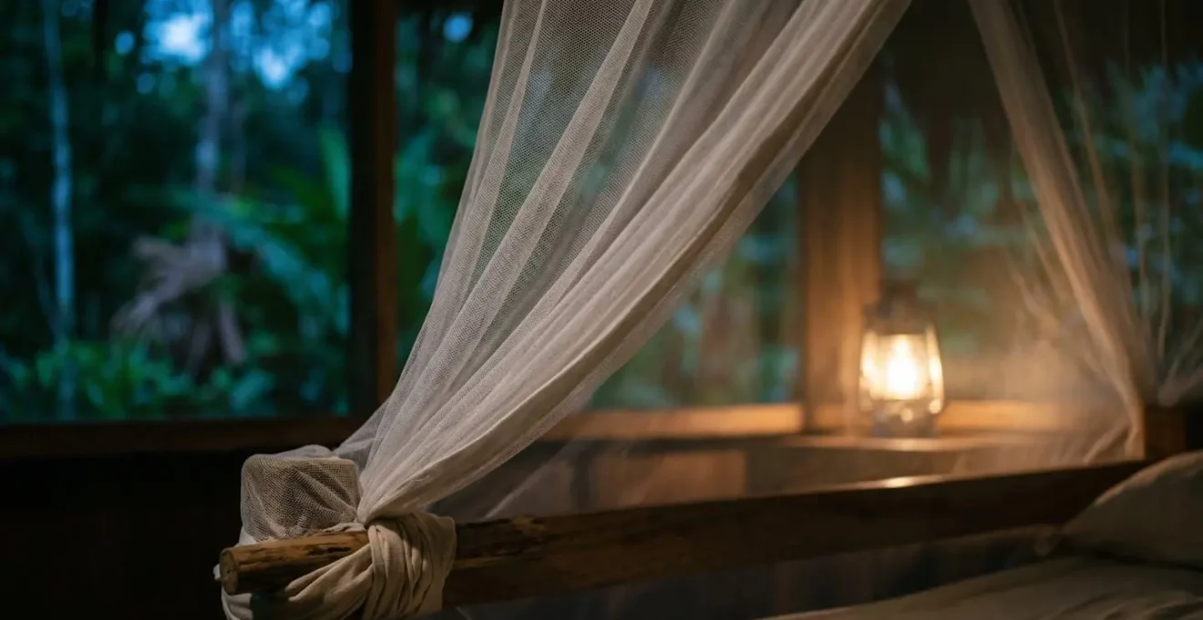 Properly secured mosquito net creating a protective sleeping space in a jungle lodge, with warm lantern light.