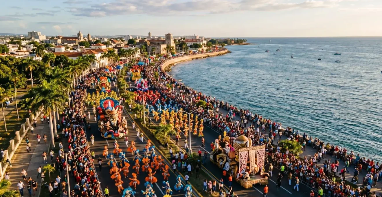 Expansive aerial view of Santo Domingo carnival parade along the Malecon with elaborate floats and coordinated dance troupes against ocean backdrop